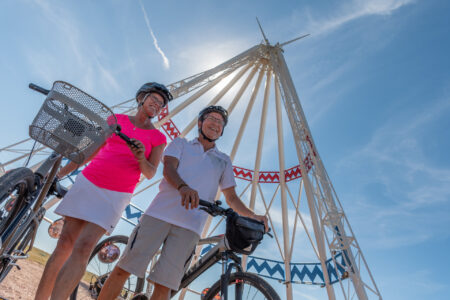 Medicine hat bikers in front of TeePee
